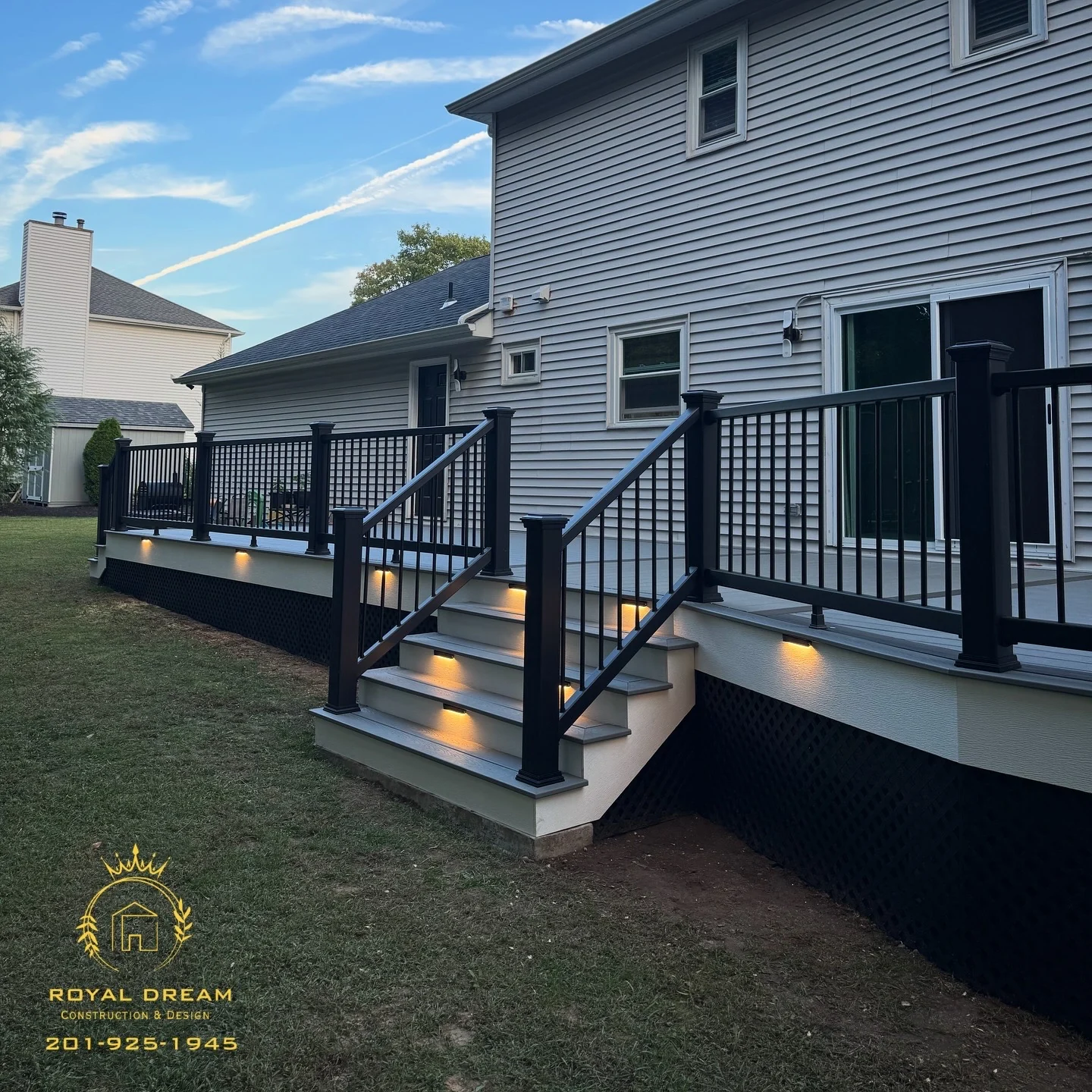 A side view of the deck, corner steps and coordinated railing details.